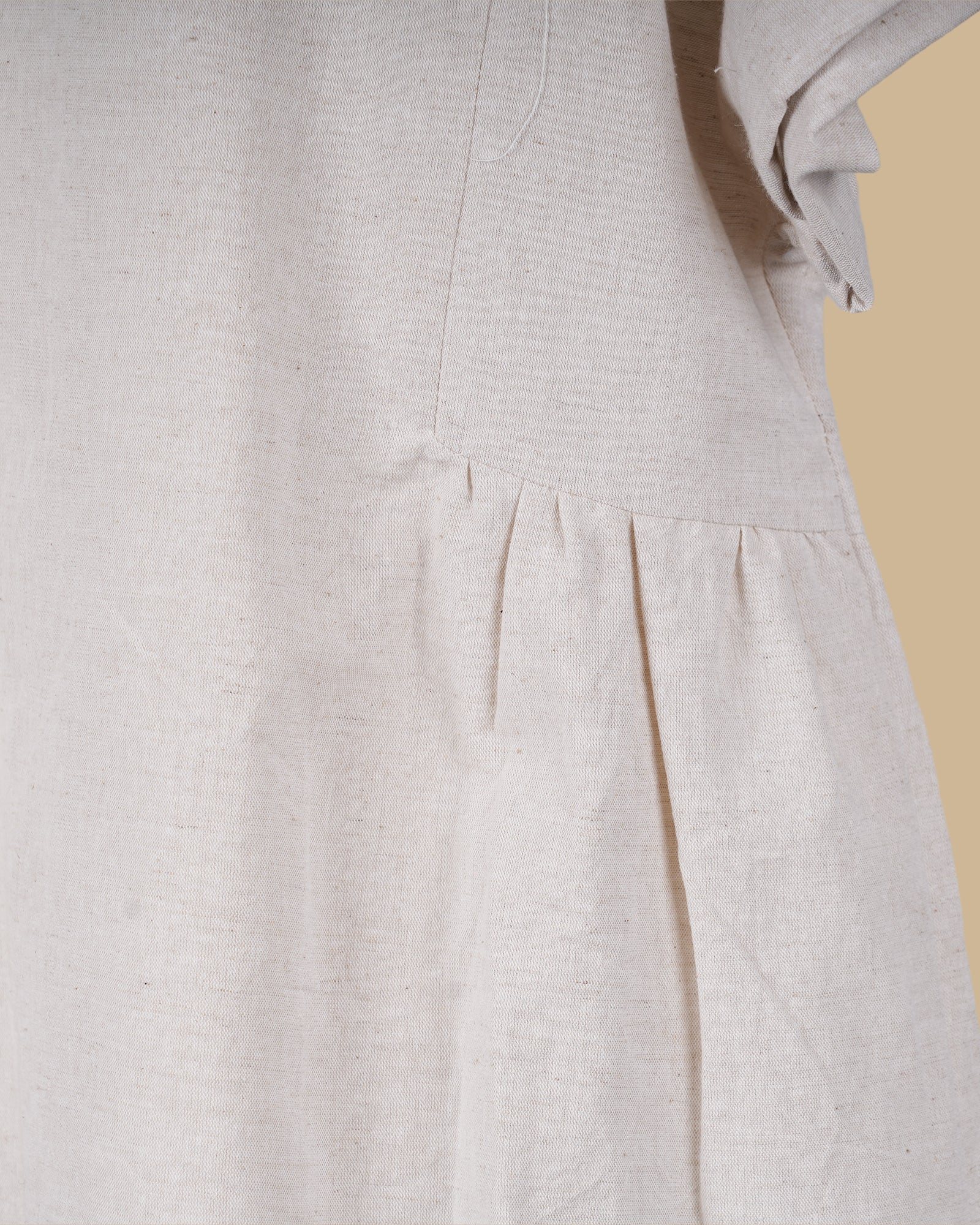 THE SOFT FLARE LINEN TOP - BEIGE